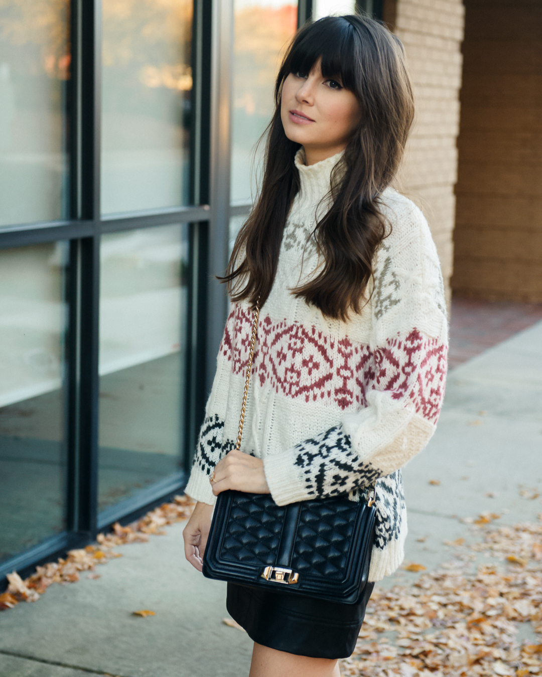 dressing up sweaters with statement bag 