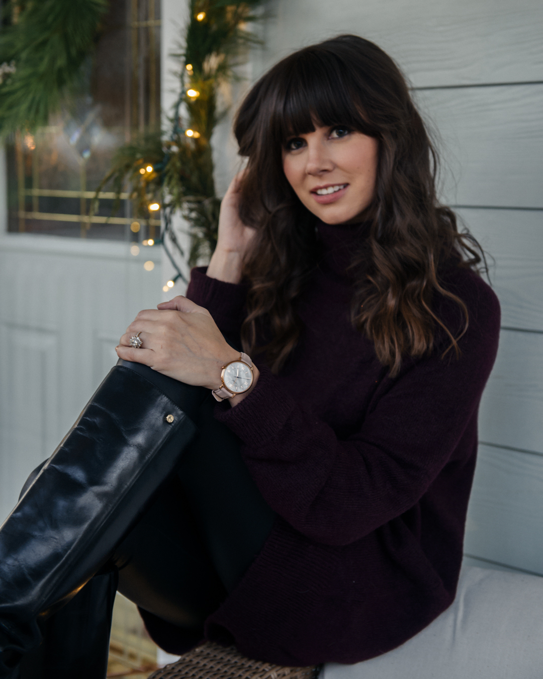 fashion photo featuring leather boots and fossil watch 