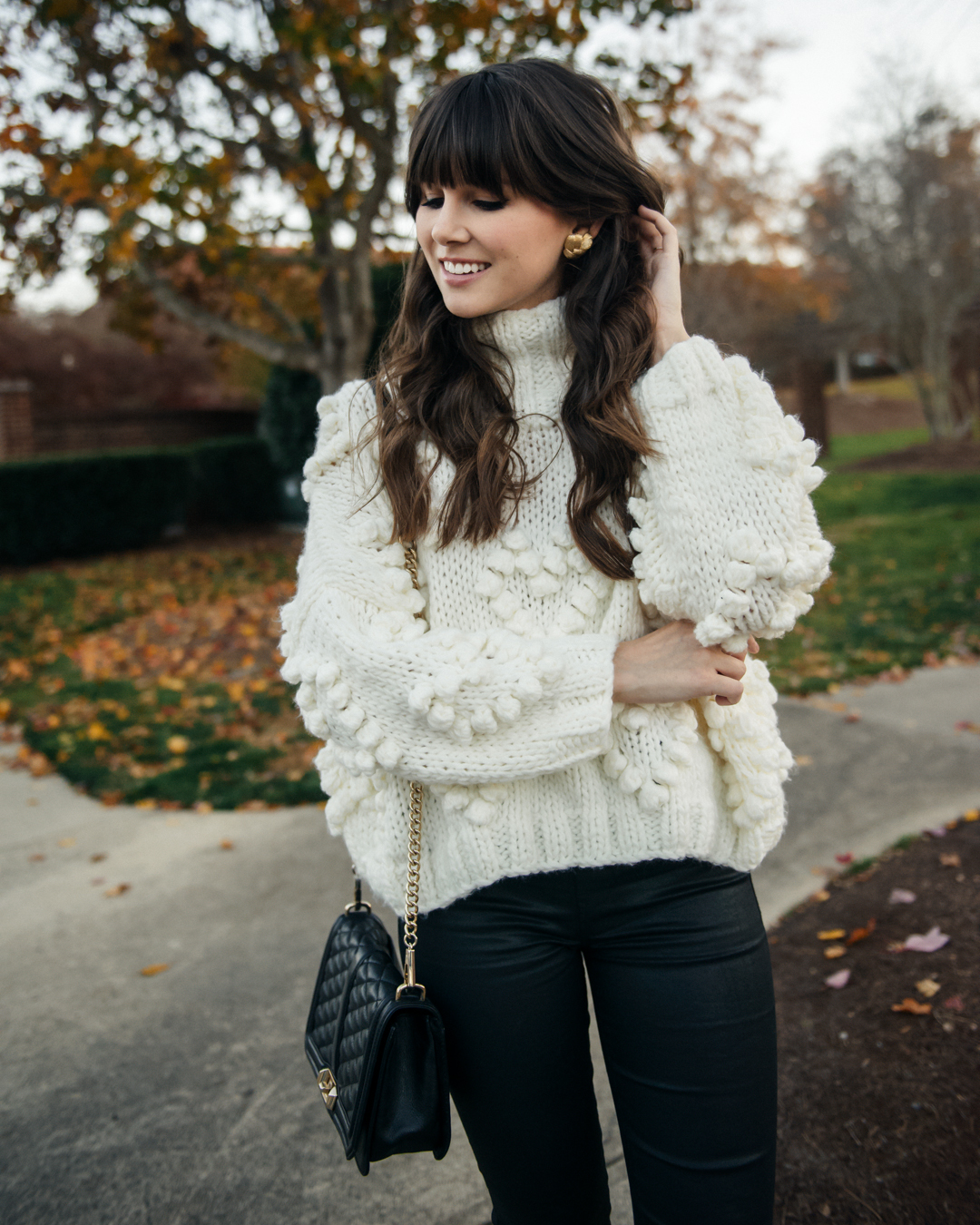 Statement vintage earrings and sweater for the holiday season 